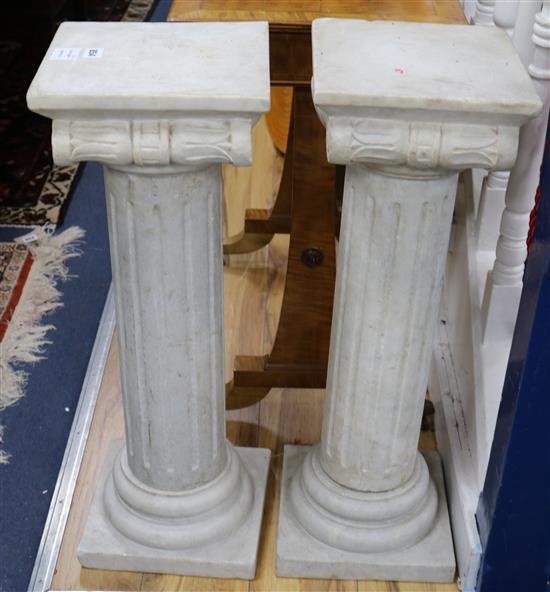 A pair of ionic marble columns W.25cm
